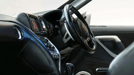 The functional style of the cockpit is replicated in precise detail.