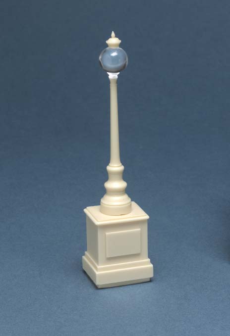 City lamp and plinth with clear resin light
