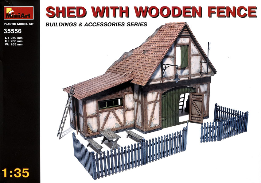 Shed with wooden fence