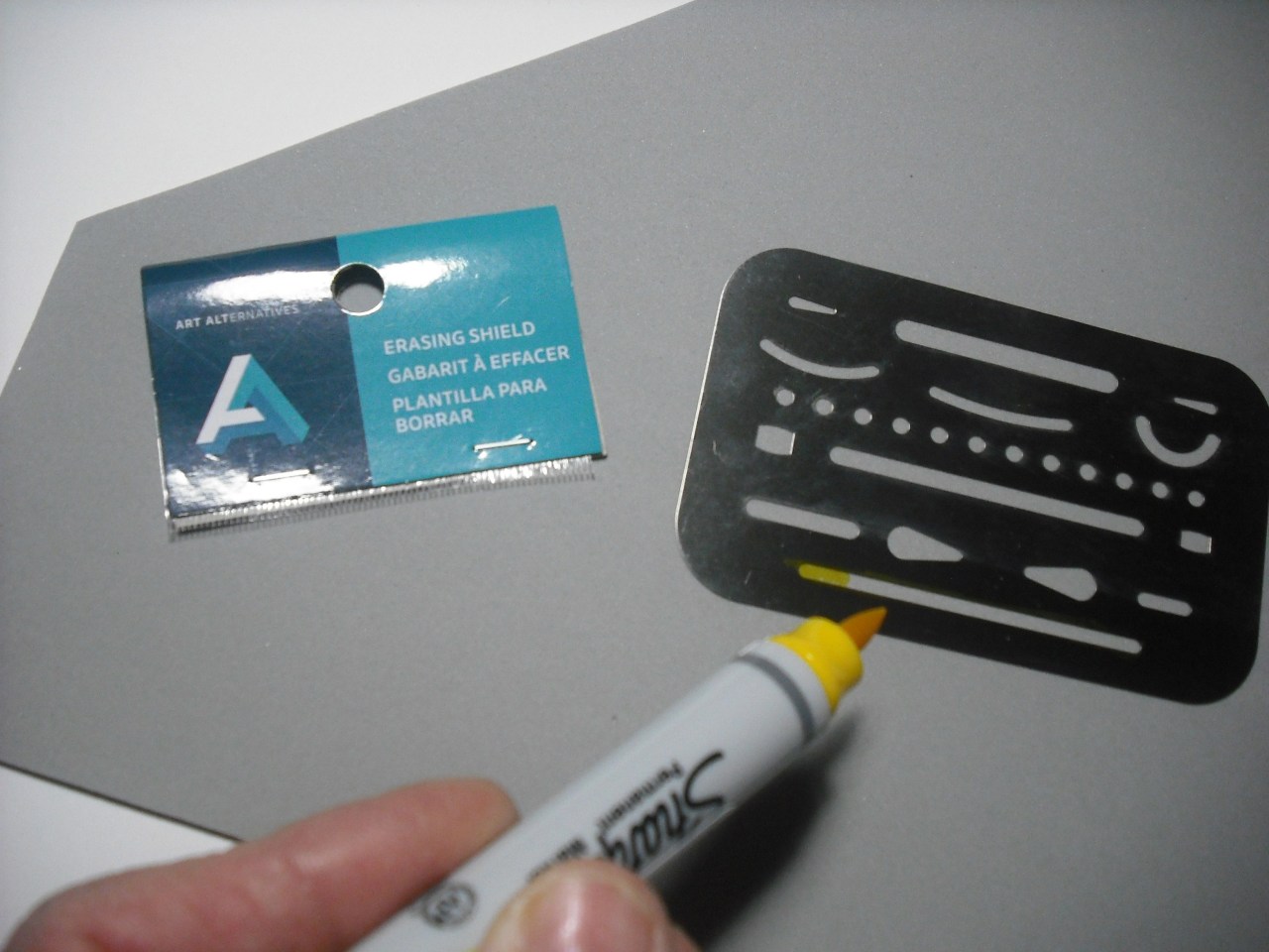 Use an eraser guide as a template