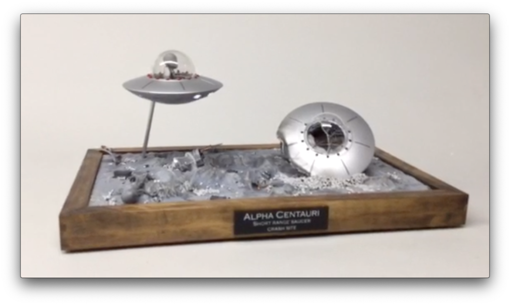 UFO diorama with flashing lights