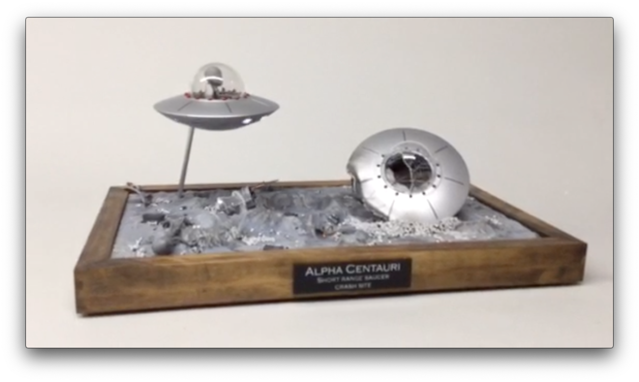 UFO diorama with flashing lights