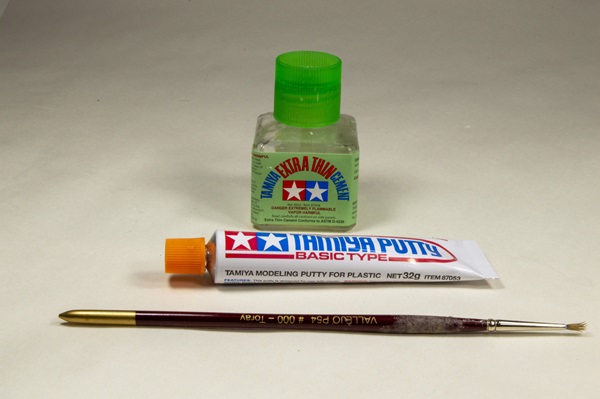 Tamiya's excellent Extra Thin Liquid cement for plastic models